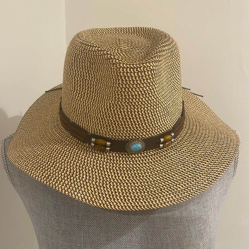 NWT , never used Panama straw hat , with western motif band . Perfect condition